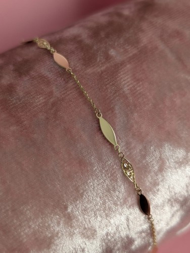 Złota bransoletka 14K próby 585 z płaskimi i ażurowymi owalnymi elementami. Regulowana długość 17–19 cm. Delikatna, kobieca, elegancka – idealna na każdą okazję.